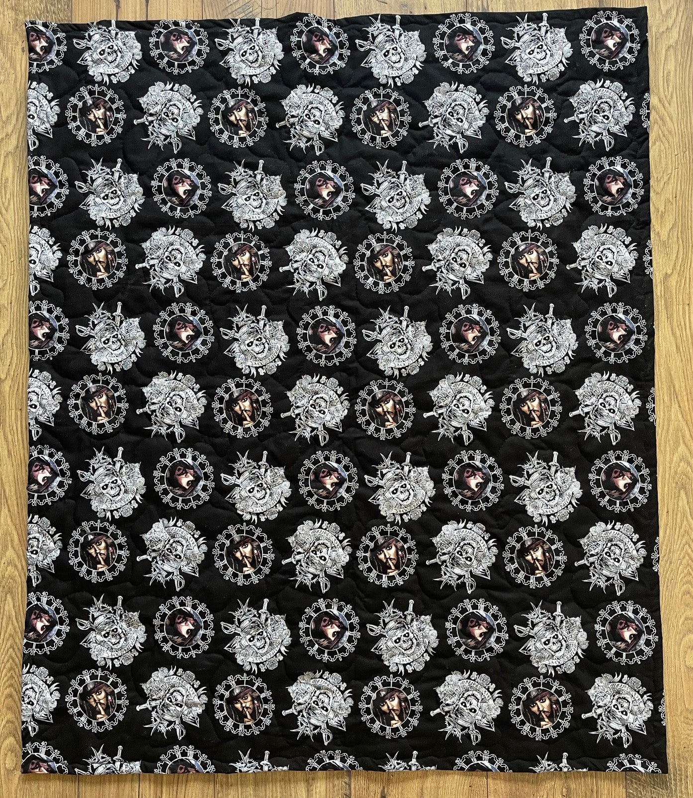 PIRATES OF THE CARIBBEAN "DEAD MEN TELL NO TALES" JACK SPARROW BACKING QUILTED BLANKET