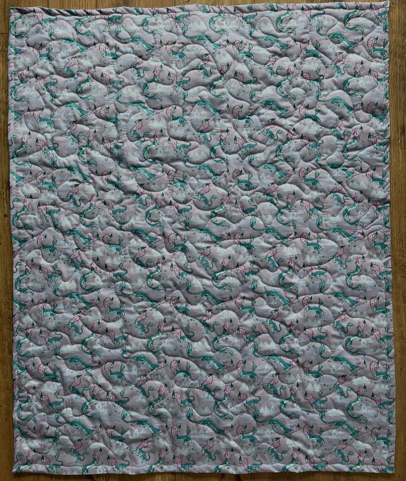 RAYA AND THE DRAGON SISU BACKING Quilted Blanket