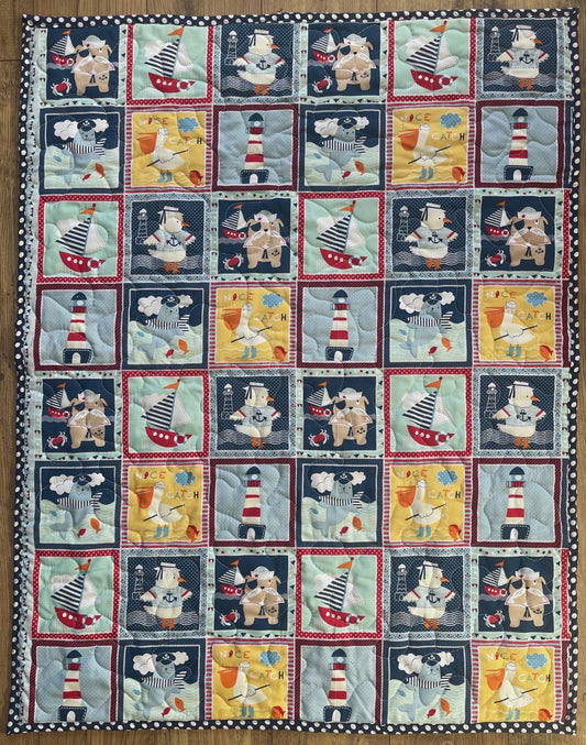 Nautical Block Nice Catch Primary Colors Quilted Blanket with Walrus, Lighthouse, Pelican, Sailboat
