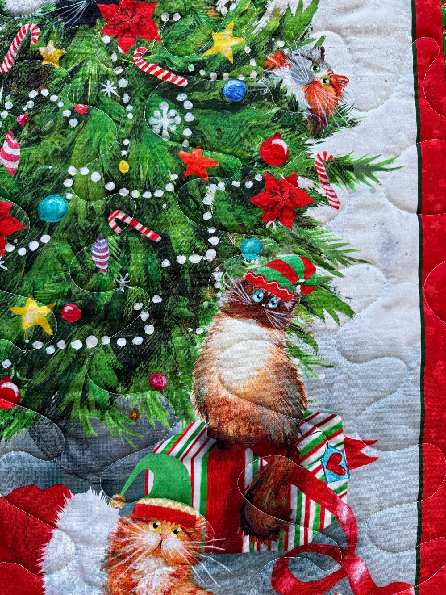 MEOWY CHRISTMAS CAT HAVING FUN IN THE CHRISTMAS TREE QUILTED BLANKET