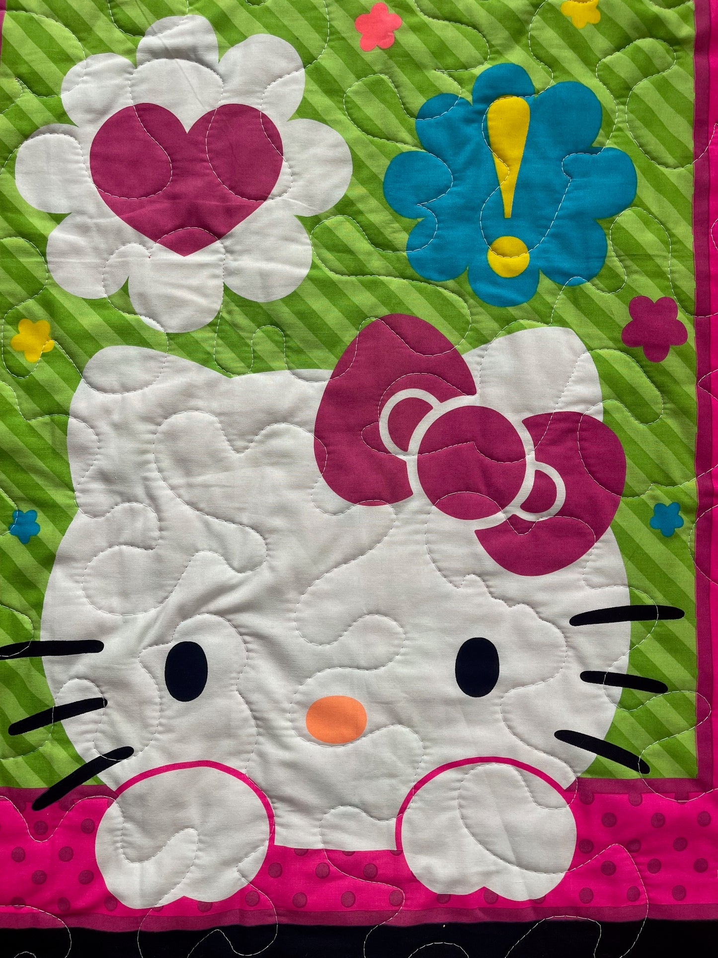 KITTY NEON EXPRESSIONS QUILTED BLANKET