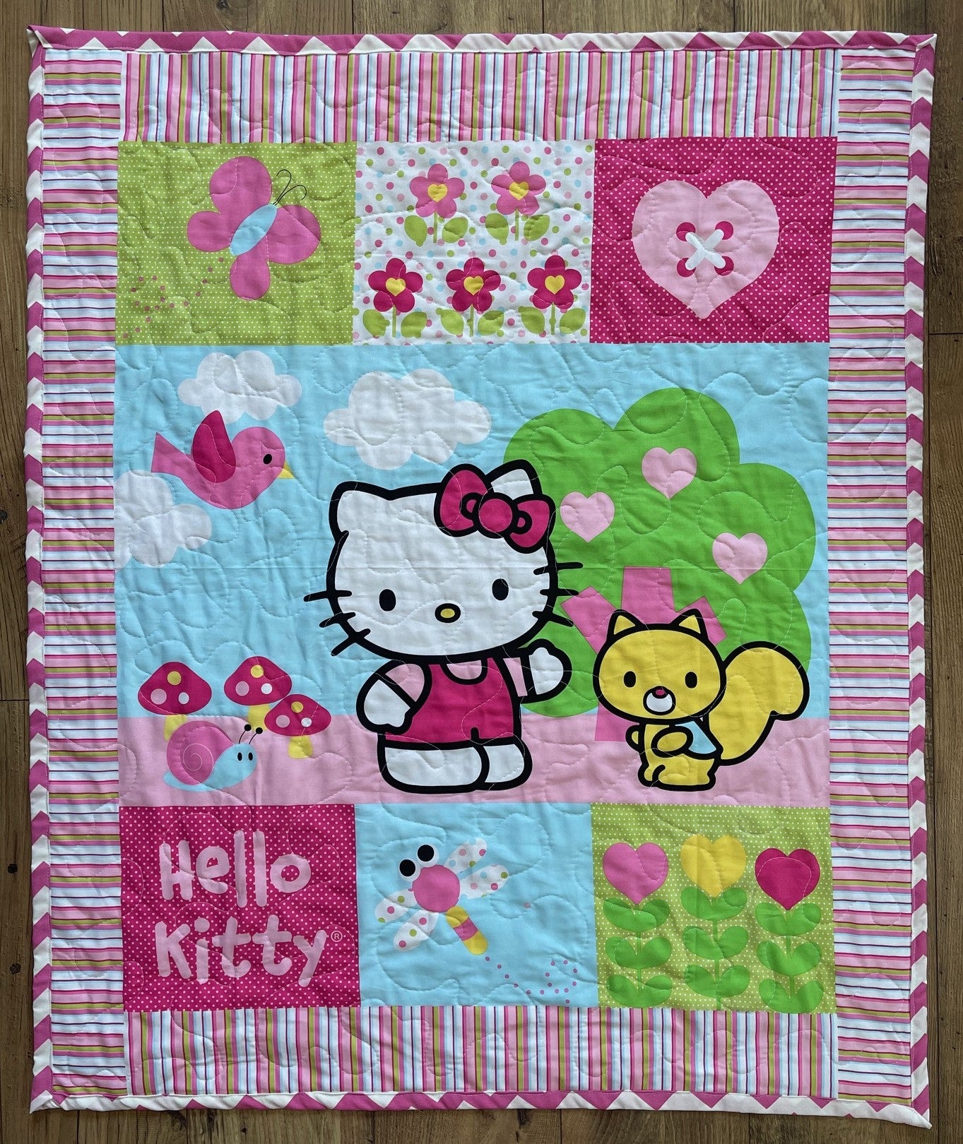 HELLO KITTY & LORRY SQUIRREL GARDEN FLOWERS QUILTED BLANKET