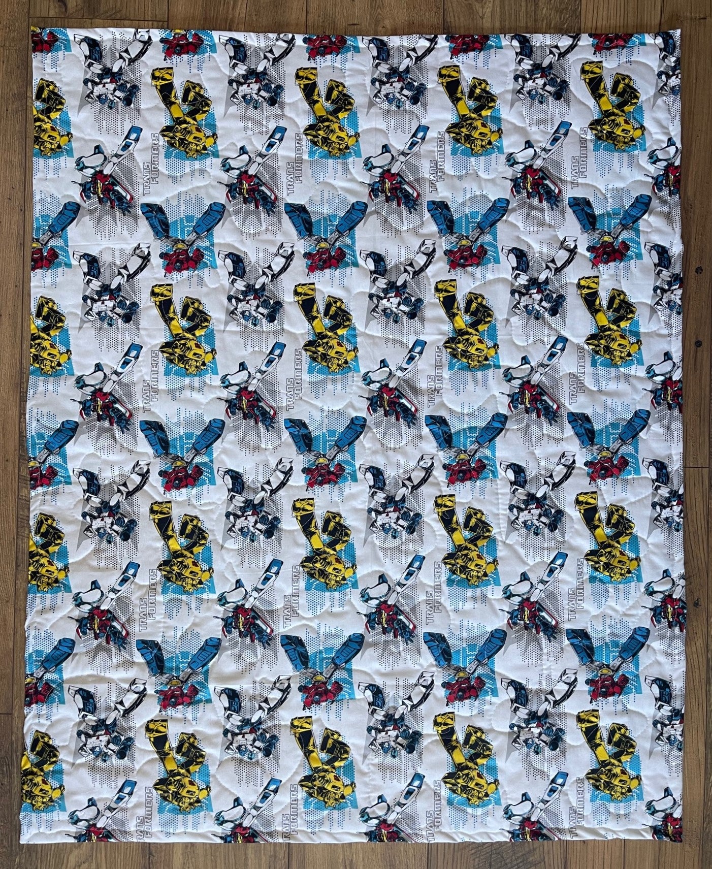 THE TRANSFORMERS *MORE THAN MEETS THE EYE* INSPIRED REVERSIBLE QUILTED BLANKET