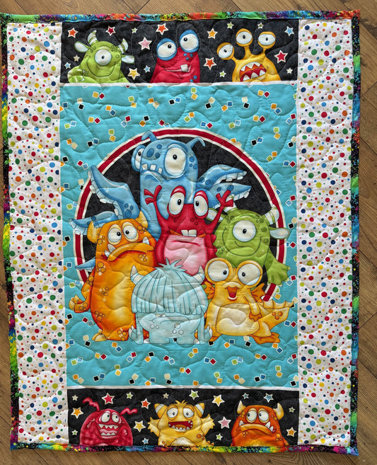 GOOGLY EYED MONSTERS QUILTED BLANKET