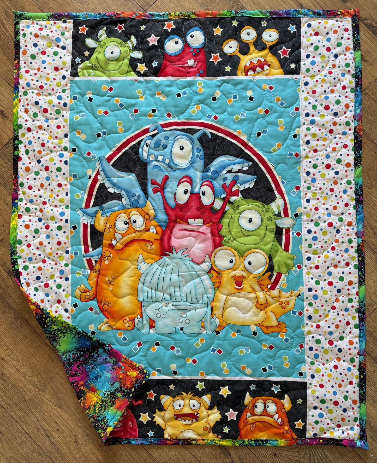 GOOGLY EYED MONSTERS QUILTED BLANKET