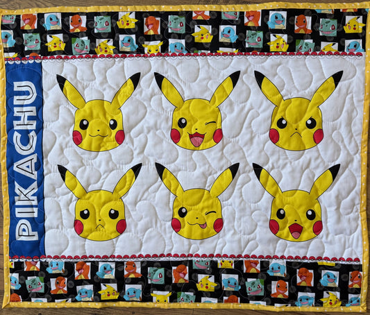 MANY FACES OF PIKACHU VIDEO GAME QUILTED BLANKET