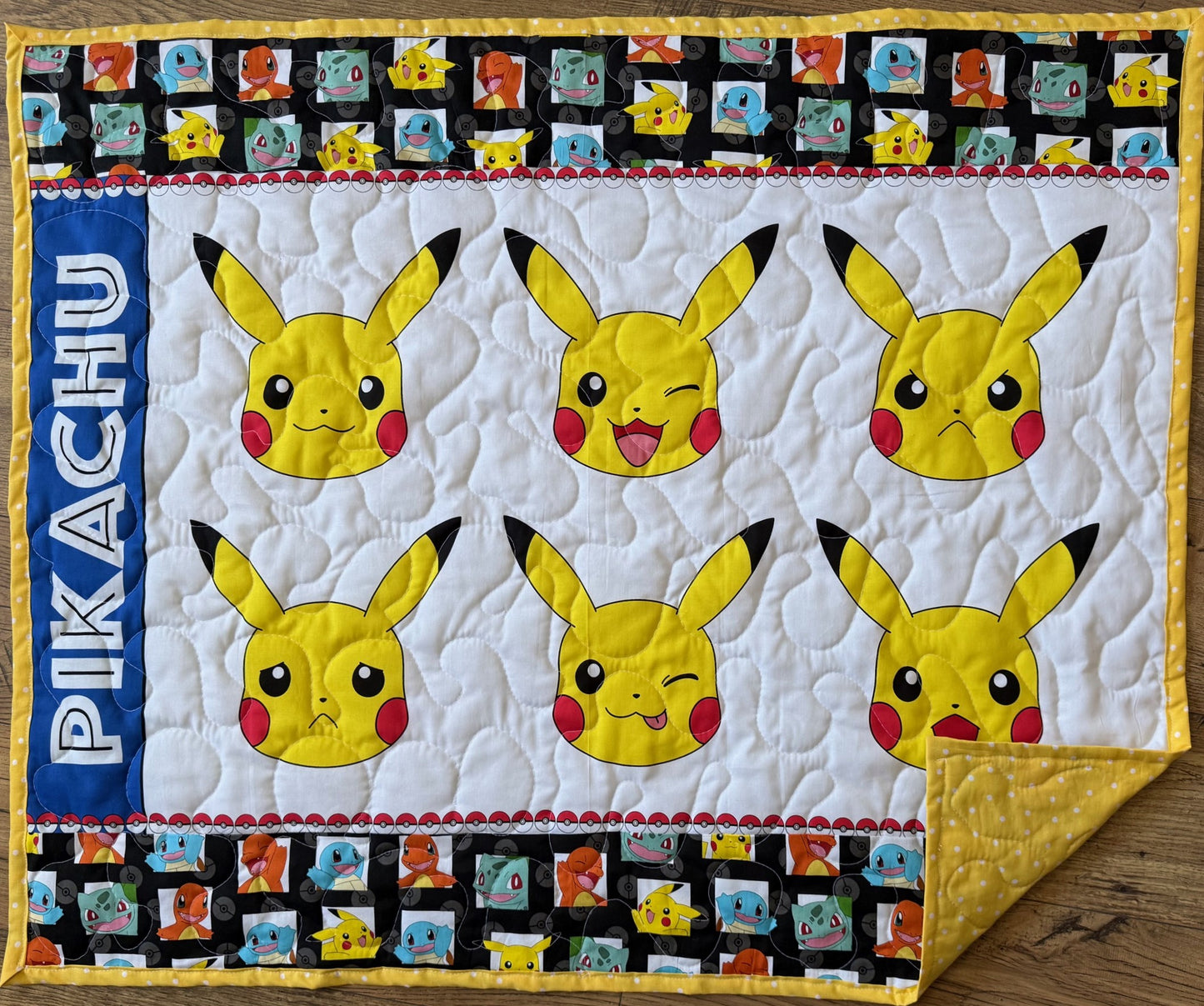 MANY FACES OF PIKACHU VIDEO GAME QUILTED BLANKET
