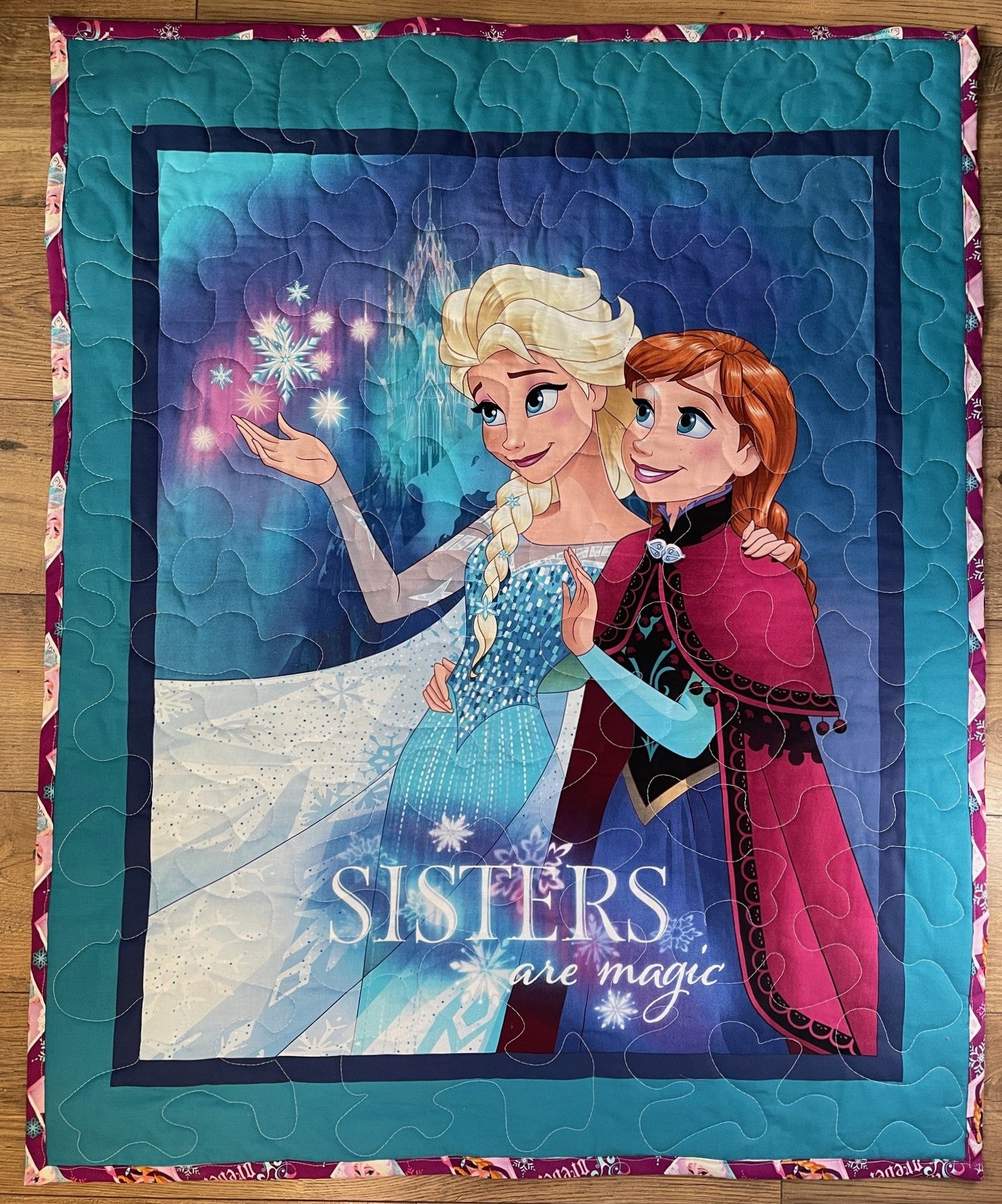 SISTERS ARE MAGIC ELSA & ANNA QUILTED BLANKET