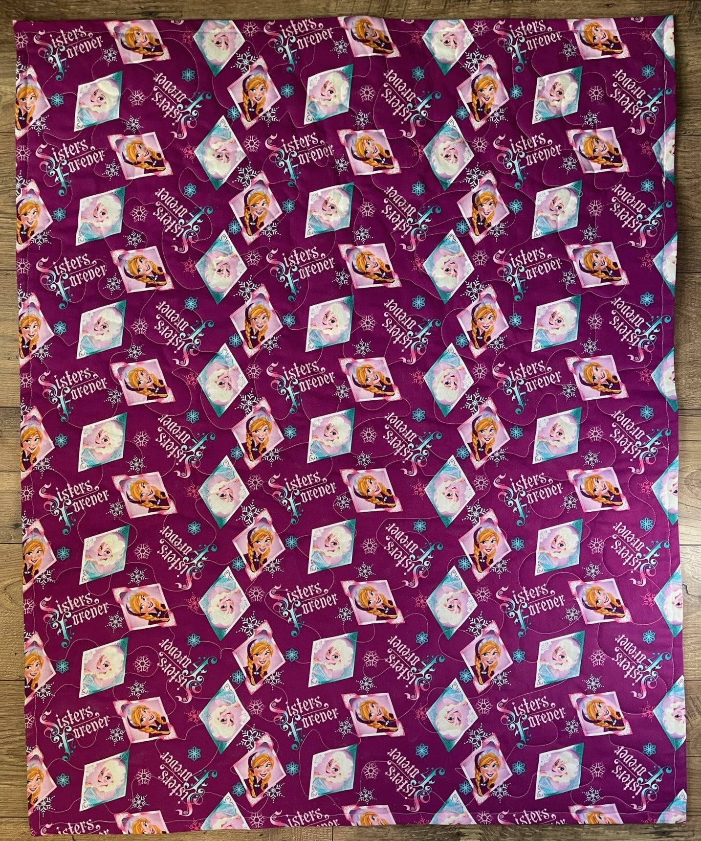 SISTERS ARE MAGIC ELSA & ANNA QUILTED BLANKET