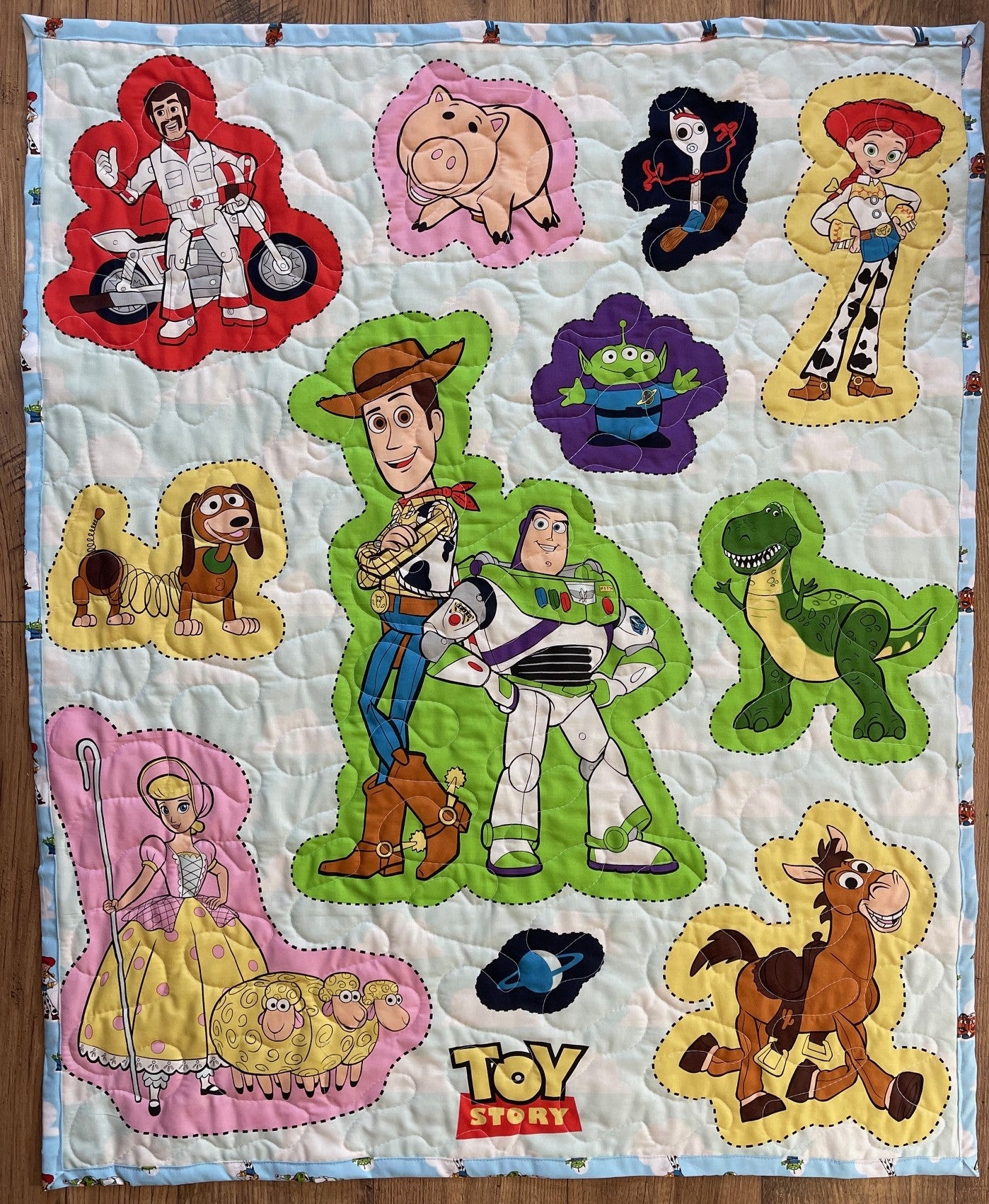 TOY STORY CHARACTERS, BUZZ LIGHTYEAR, SHERIFF WOODY, JESSE & BO PEEP INSPIRED QUILTED BLANKET