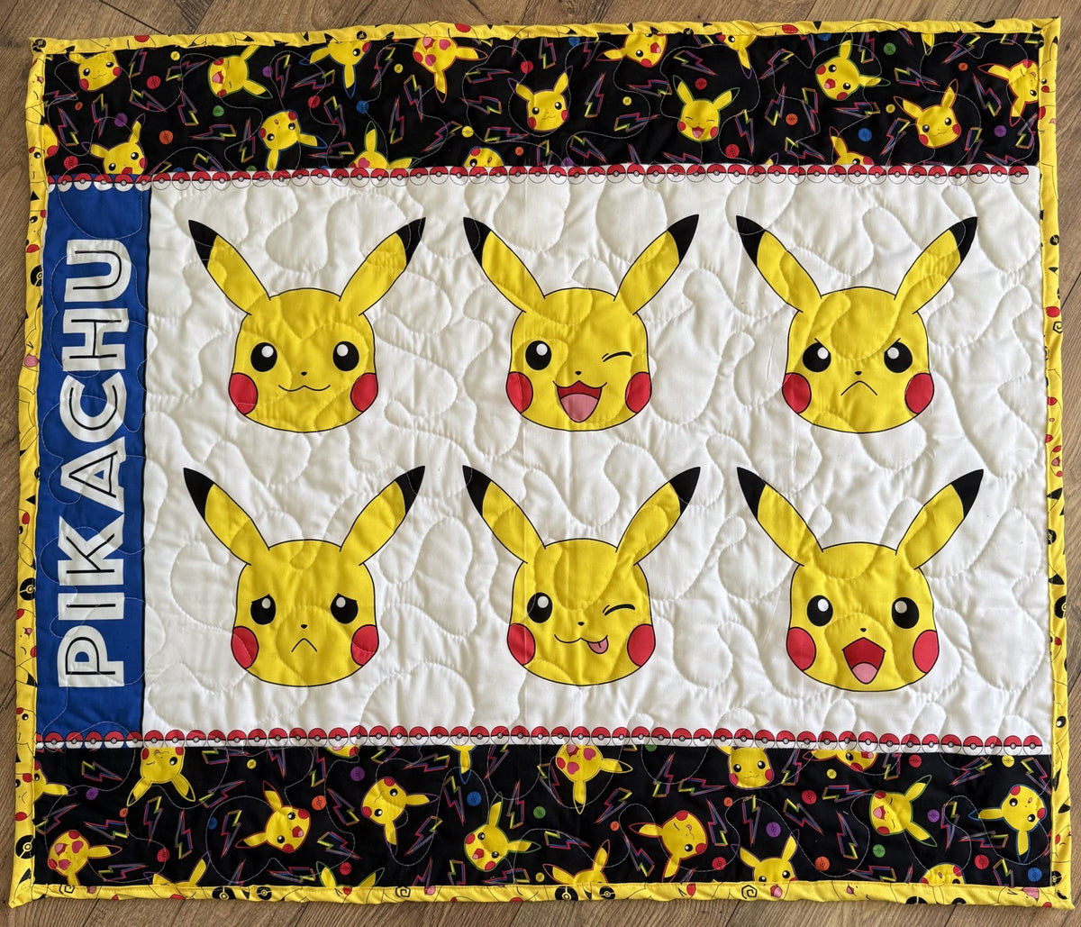 MANY FACES OF PIKACHU VIDEO GAME REVERSIBLE QUILTED BLANKET