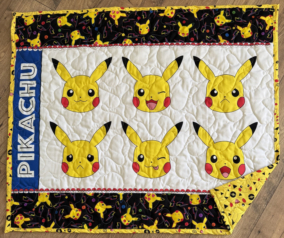 MANY FACES OF PIKACHU VIDEO GAME REVERSIBLE QUILTED BLANKET