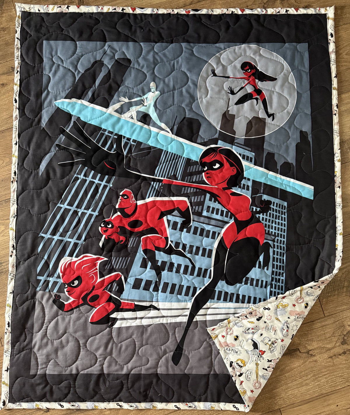 THE INCREDIBLES SAVE THE CITY REVERSIBLE QUILTED BLANKET