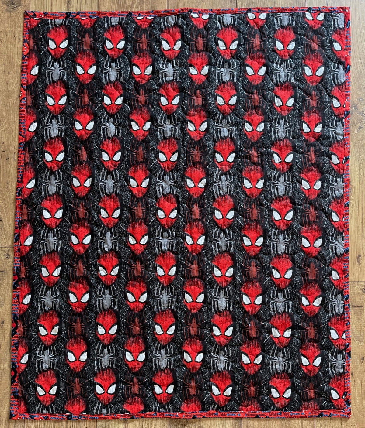 THE AMAZING SPIDER-MAN REVERSIBLE QUILTED BLANKET