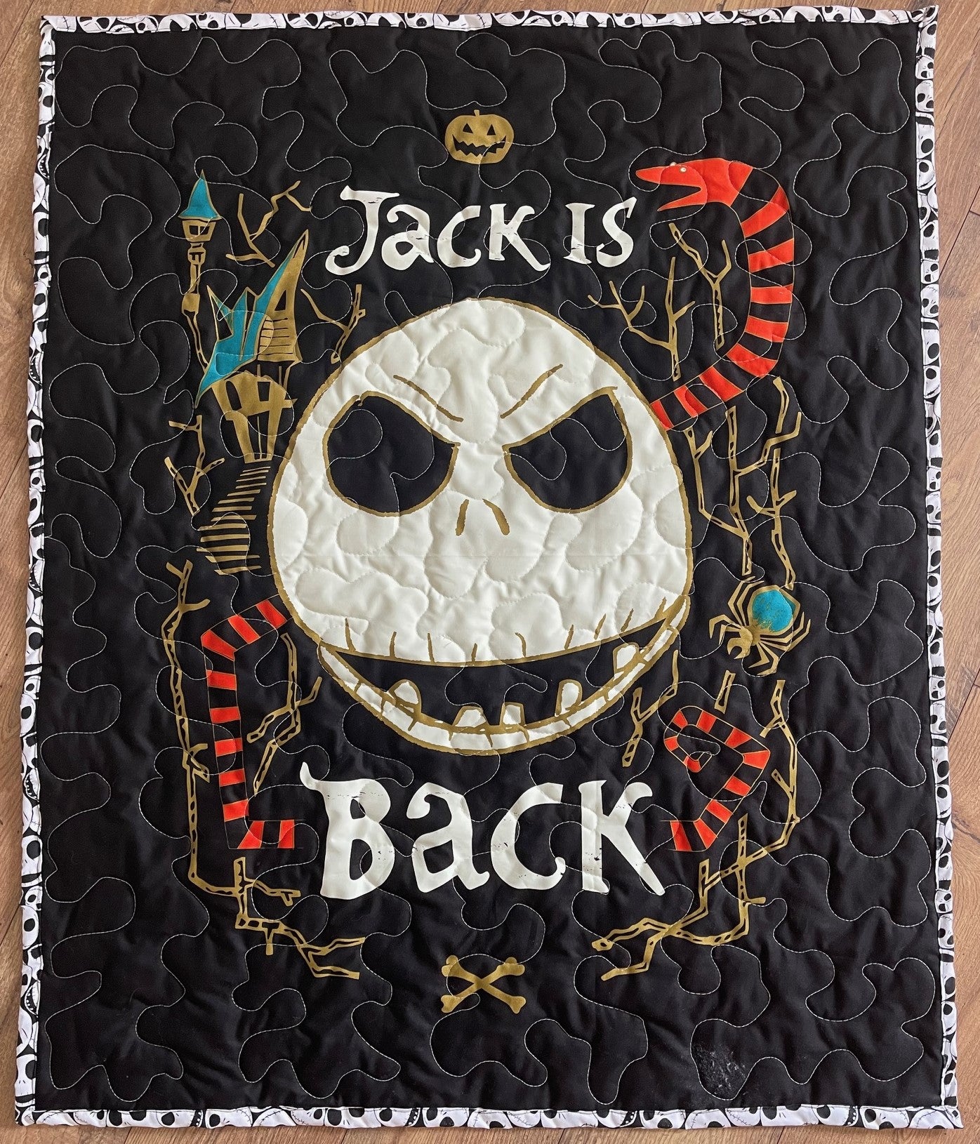 NIGHTMARE BEFORE CHRISTMAS JACK IS BACK GLOWS IN THE DARK QUILTED BLANKET 