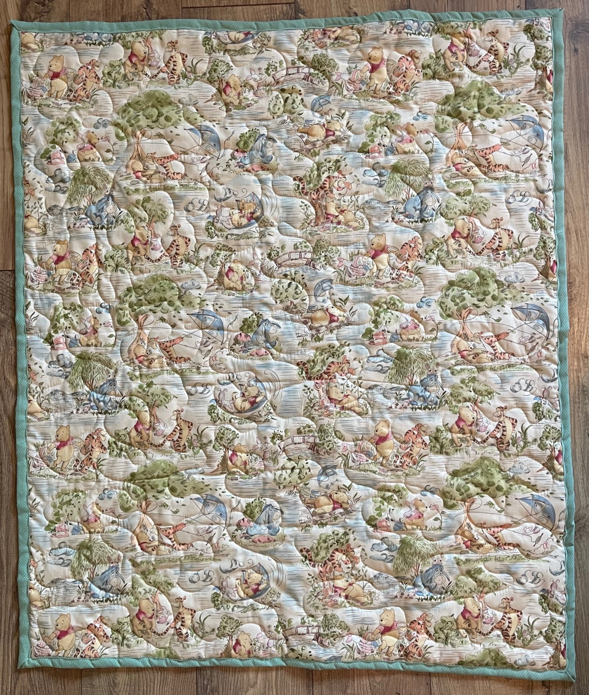 WINNIE THE POOH CHARACTERS IN BLUSTERY DAY INSPIRED QUILTED BLANKET