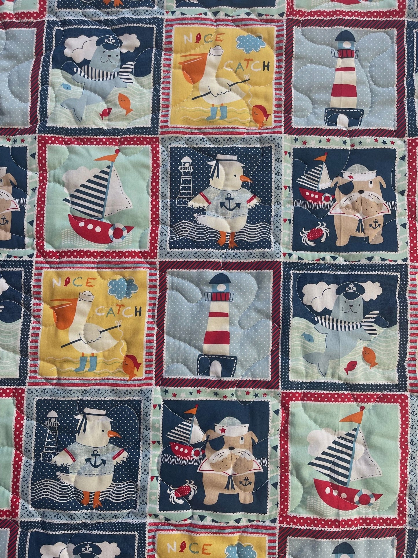 Nautical Block Nice Catch Primary Colors Quilted Blanket with Walrus, Lighthouse, Pelican, Sailboat