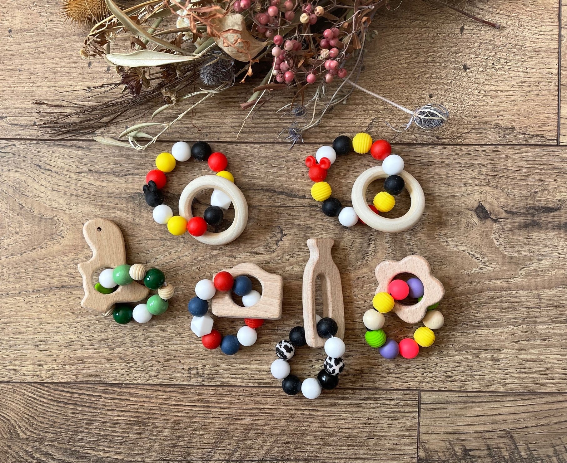 Wood Teethers with Silicone Beads Sensory Toys, Mickey Mouse inspired Mickey Ears, Dinosaur, Camera, Milk, Flower