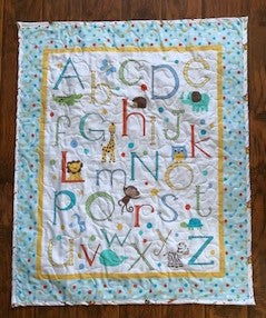 ABCs ANIMALS QUILTED BLANKET